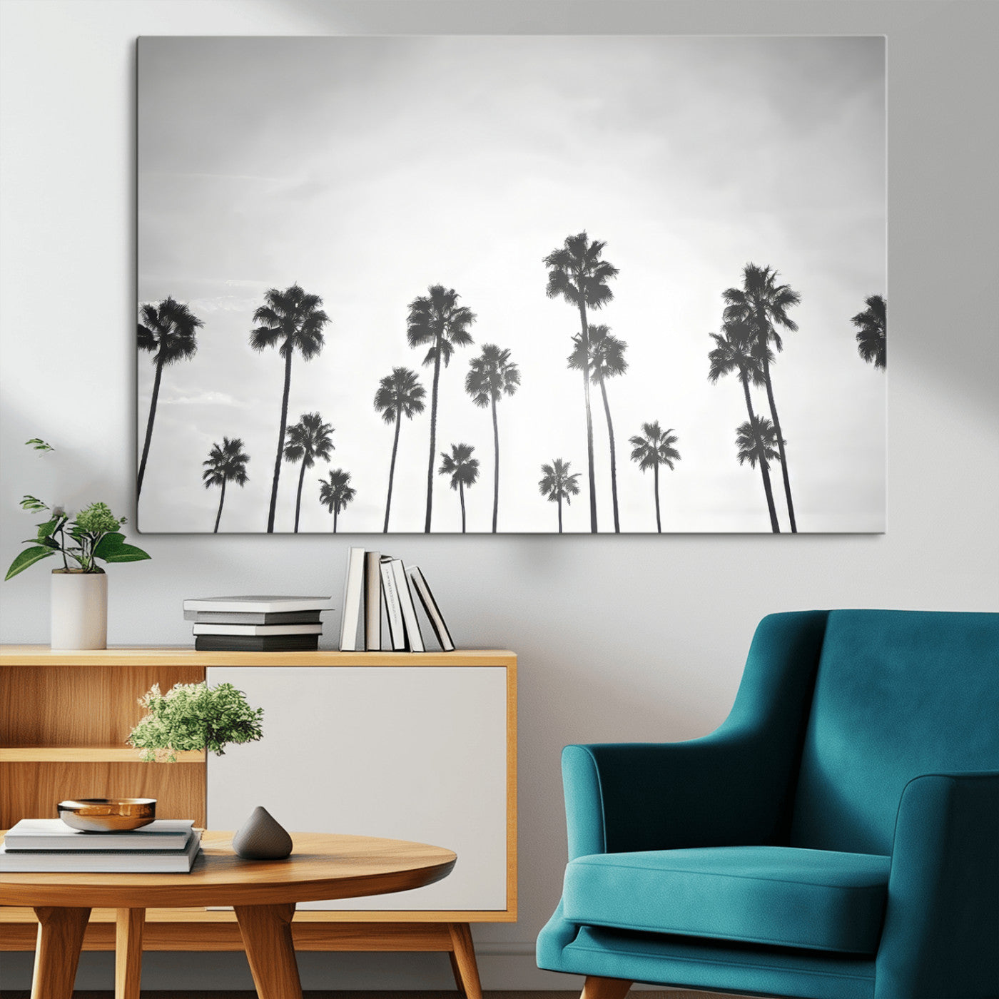 A black and white minimalist scene featuring tall palm trees silhouetted against a bright sky, creating a dreamy and timeless tropical aesthetic.