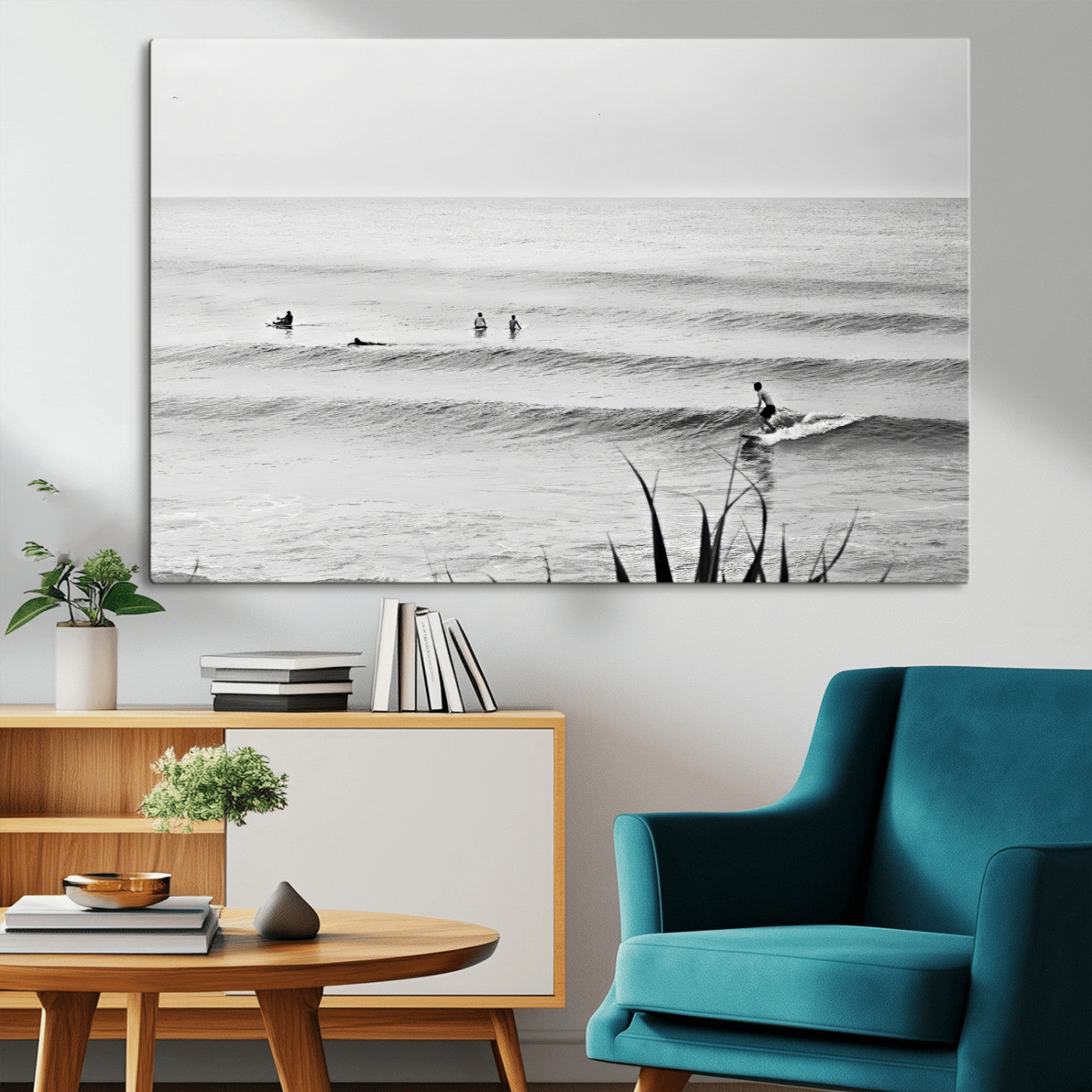 Monochrome canvas of surfers on calm ocean waves, ideal for minimalist coastal or beach-inspired interior decor.