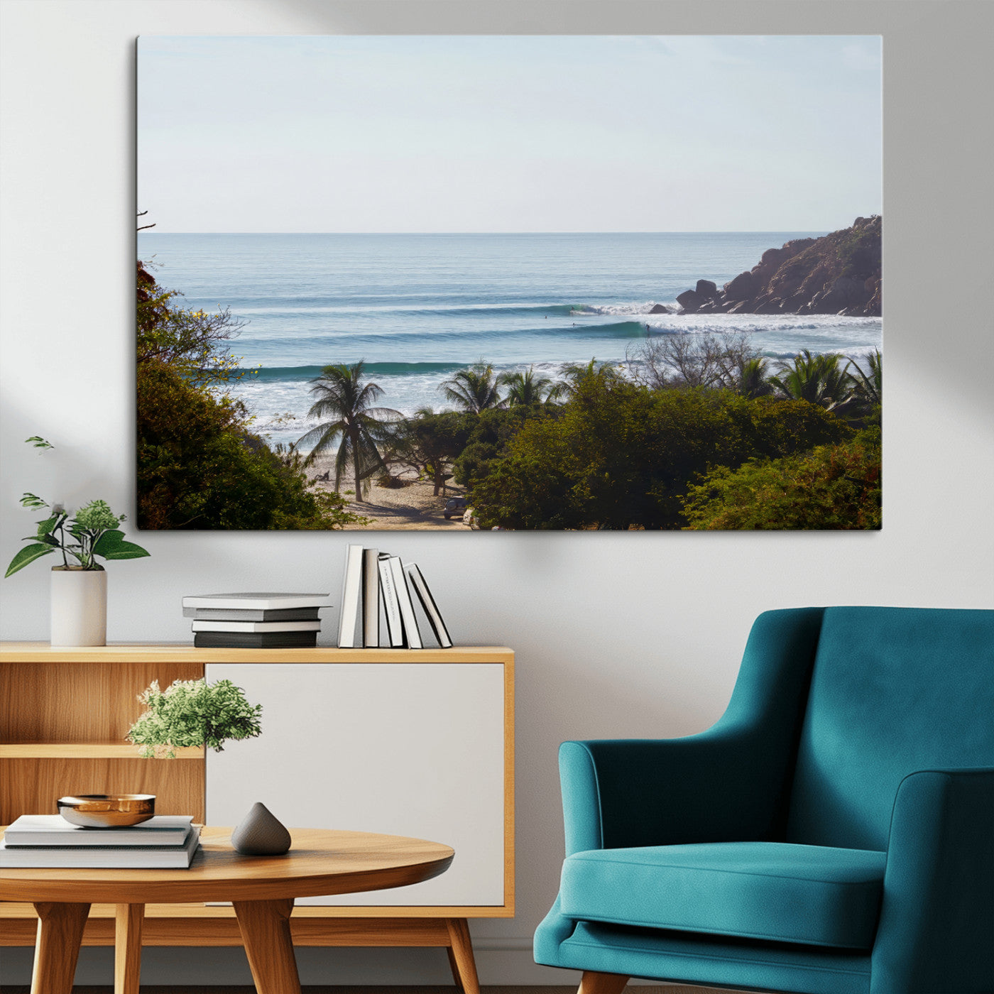 View of calm ocean waves with palm trees and a tropical coastline, ideal for coastal boho or beach-themed wall decor.
