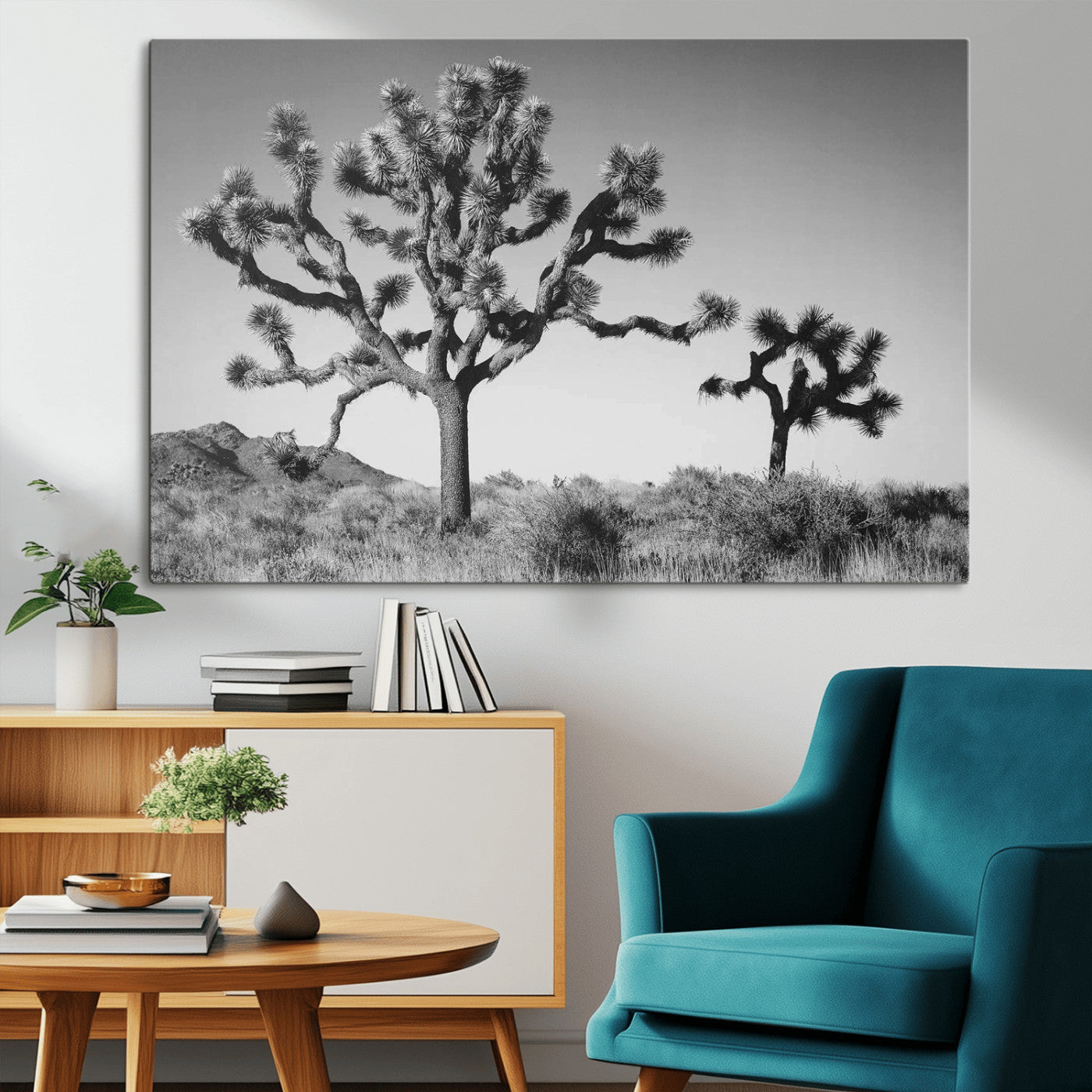 Black and white desert scene with two Joshua trees under clear sky, perfect for rustic or boho-inspired home decor.
