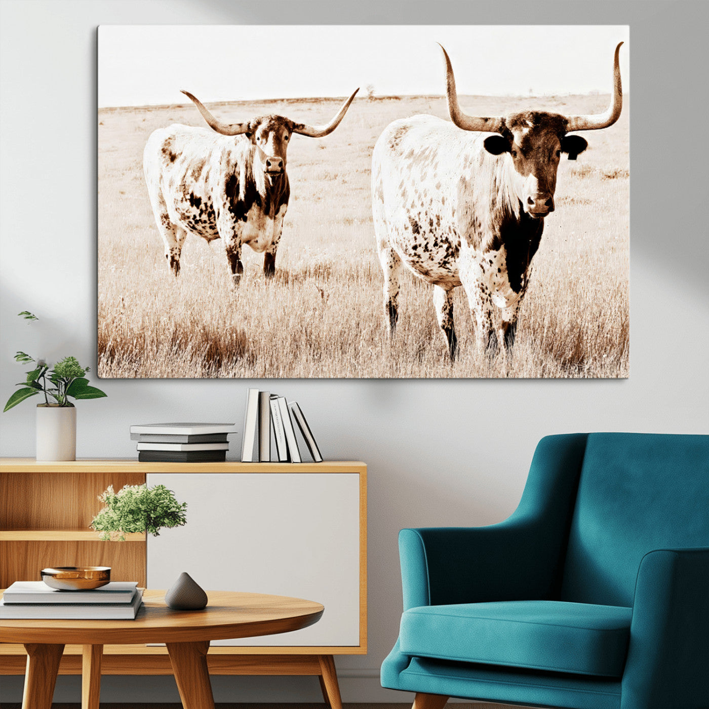 Two Texas longhorn cows standing in a sepia-toned pasture, evoking rustic charm perfect for farmhouse or western country interiors. (