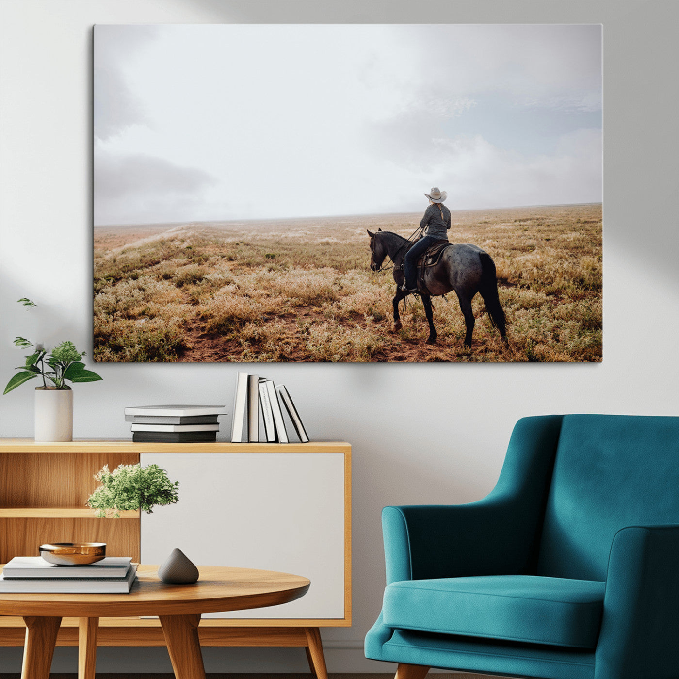 A lone cowboy riding horseback across an open prairie under a vast sky, capturing the rugged and timeless spirit of the Western frontier.