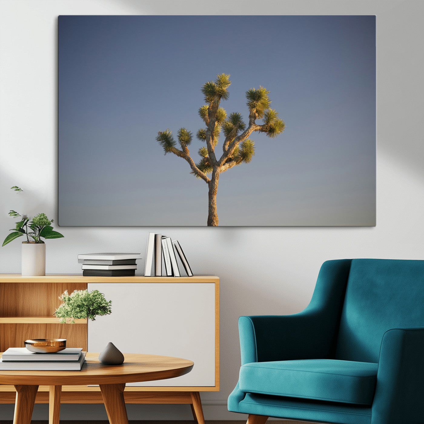 A lone Joshua Tree standing against a deep blue sky, capturing the serene and rugged beauty of the Southwestern desert landscape.
