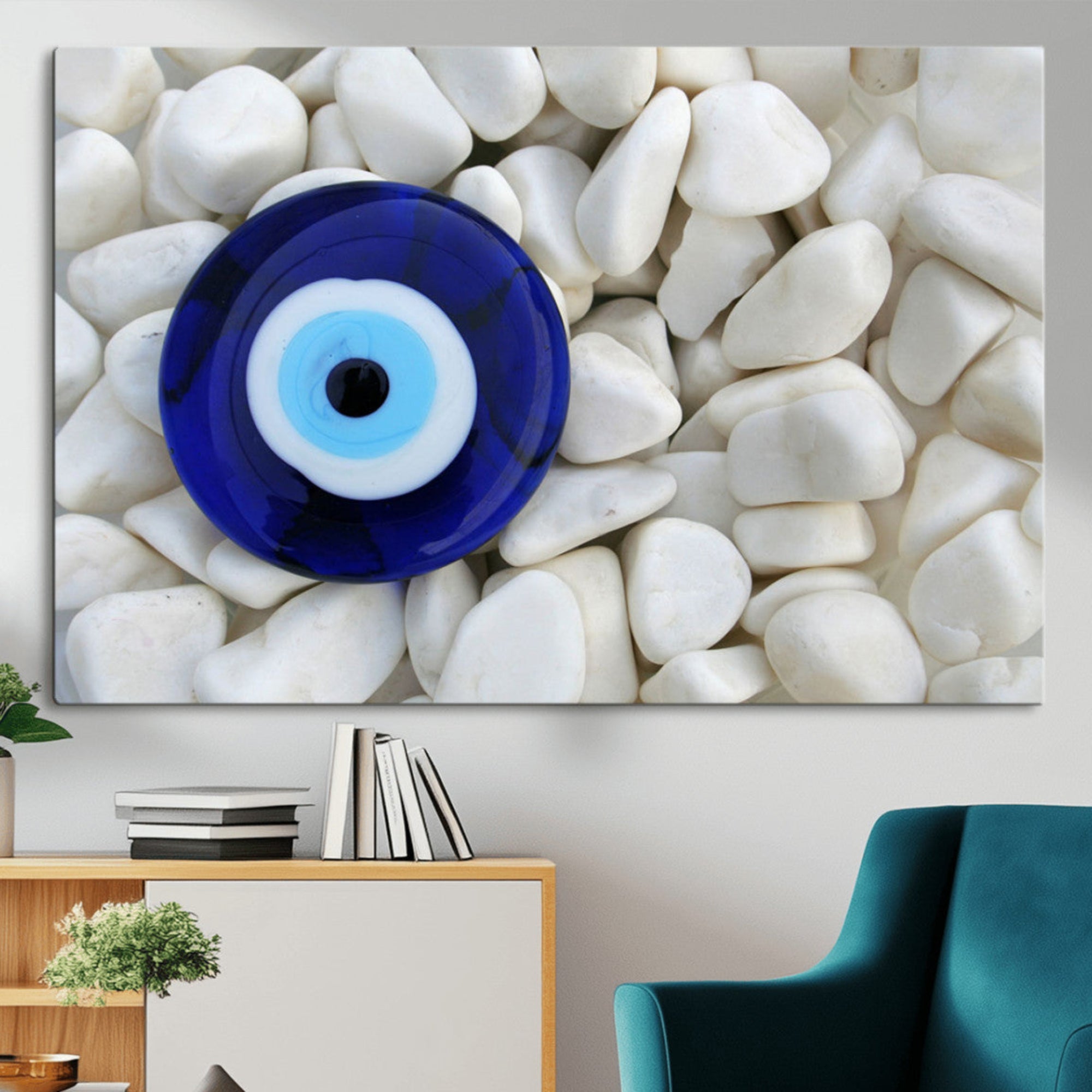 A close-up of a blue evil eye charm placed on white pebbles, symbolizing protection and good luck.