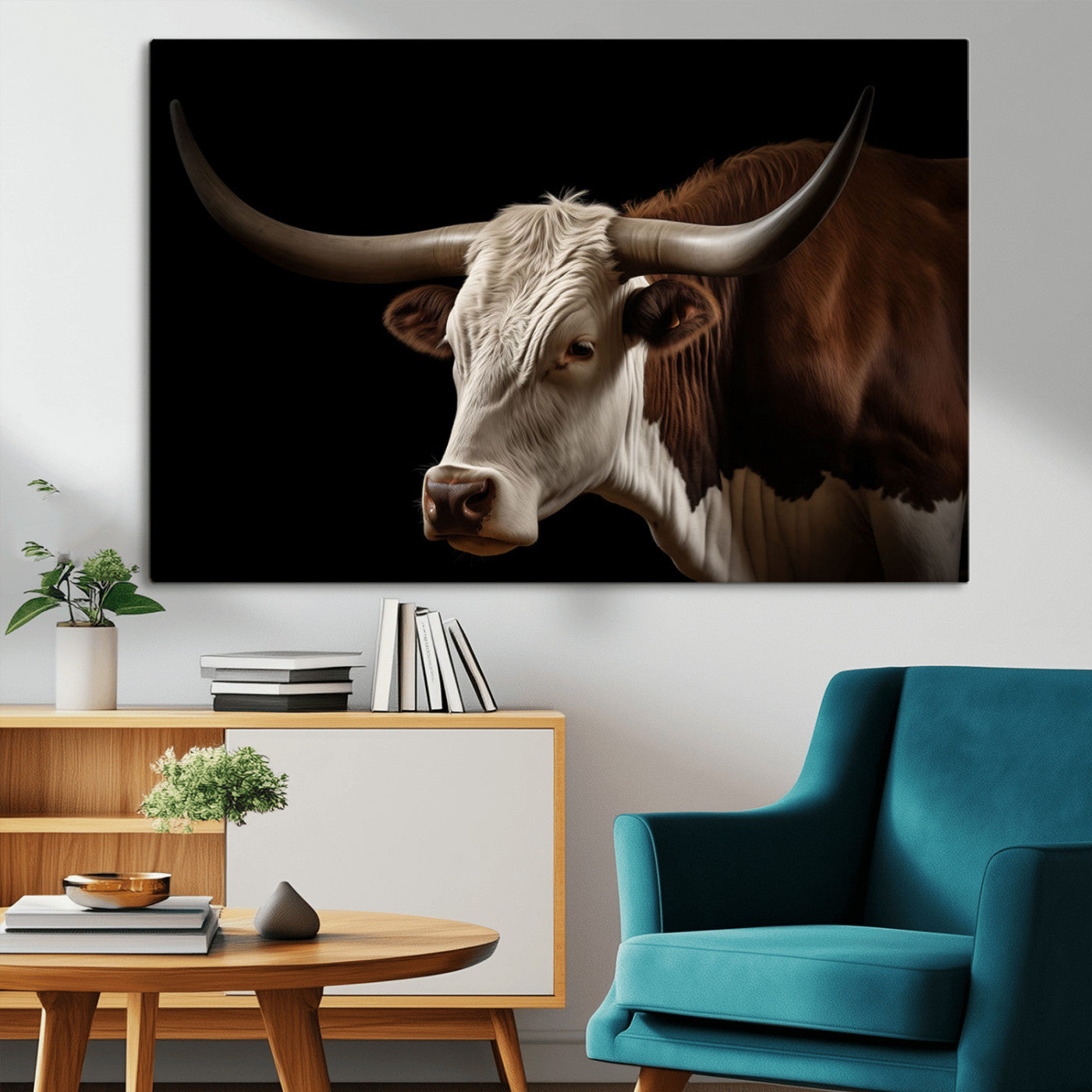 "Close-up of a brown and white longhorn cow with prominent curved horns against a black background."