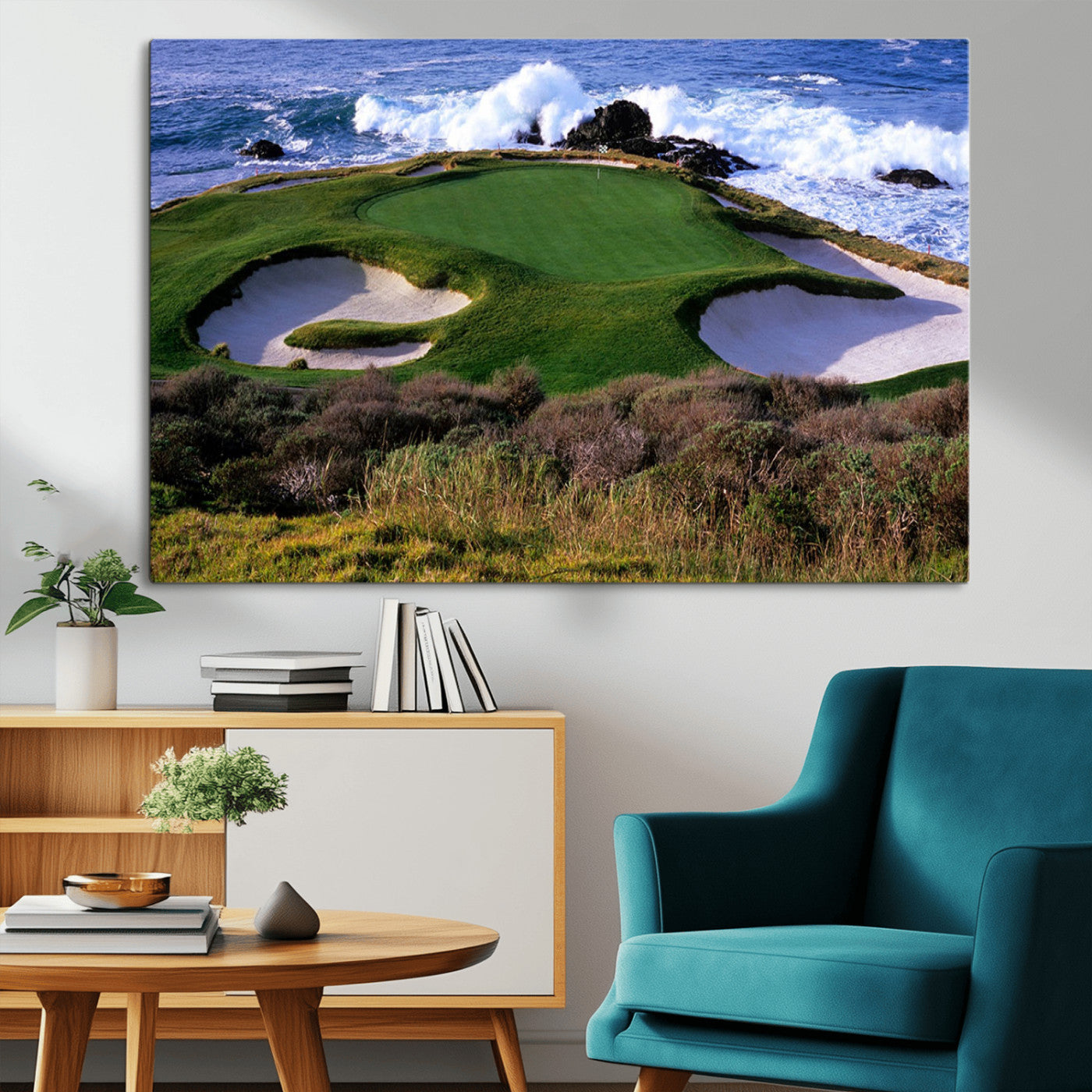 A scenic golf course located by the ocean, featuring a well-manicured green surrounded by sand traps and powerful ocean waves crashing on the shore.