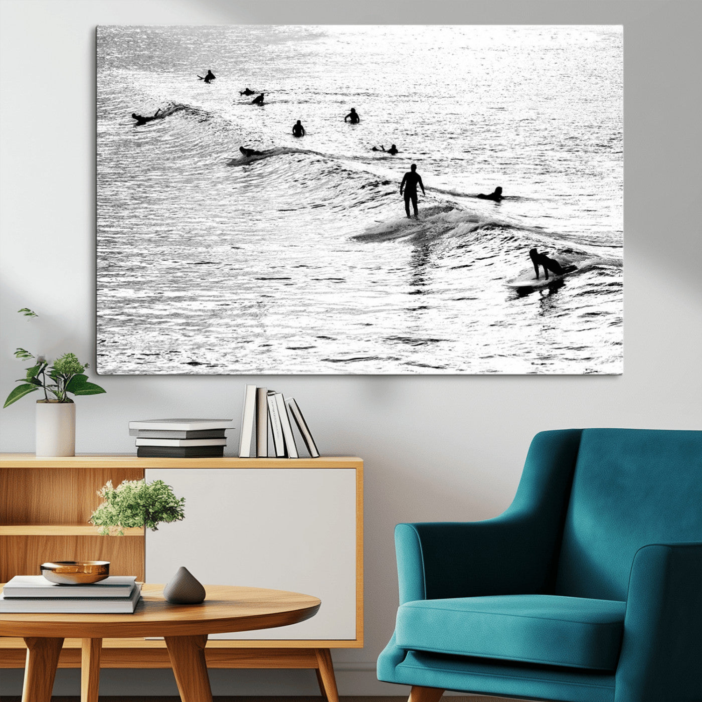 19970637-MGV-CV-36X24-Black and white artistic view of surfers riding and paddling on waves in the ocean, capturing the dynamic motion and energy of surfing