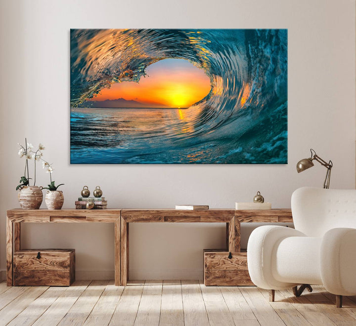 The Ocean Wave Sunset Wall Art canvas print features a vibrant ocean wave at sunset, forming a tunnel with silhouetted mountains.