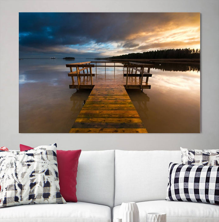 The "Serene Lake Pier at Sunset" landscape canvas print, crafted as ready-to-hang and framed wall art, enriches the contemporary setting by capturing the tranquility of a lakeside pier at sunset.