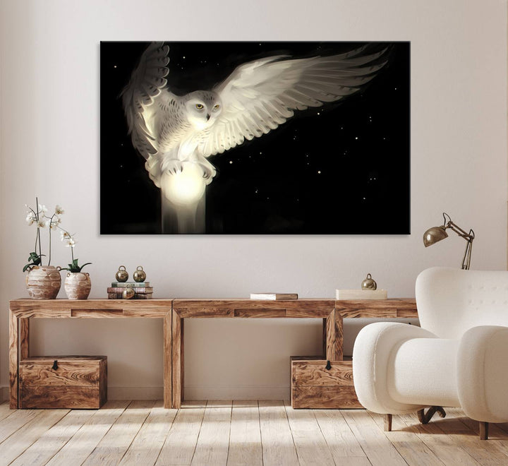 The Night Owl Art graces the wall with its depiction of a snowy owl on a glowing orb, perfect for modern decor.