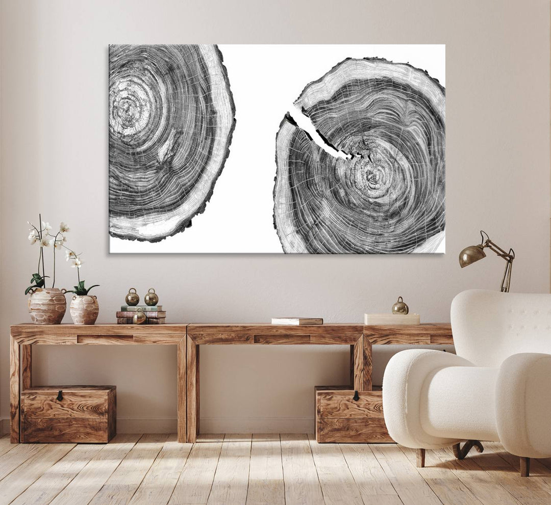 The modern black and white tree rings canvas art adds minimalist geometric decor with nature inspiration.