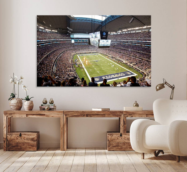 The wall art is a Dallas Cowboys AT&T Stadium Canvas Print, showcasing the iconic logo.