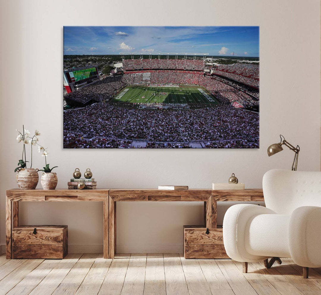 The wall art is a South Carolina Gamecocks print, showcasing Williams-Brice Stadium from a distance under clear skies.