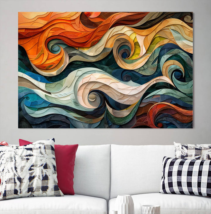 Abstract Wave Wall Art is a ready-to-hang framed canvas print featuring swirling orange, blue, and white patterns. It's perfect for adding vibrant decor to modern spaces.