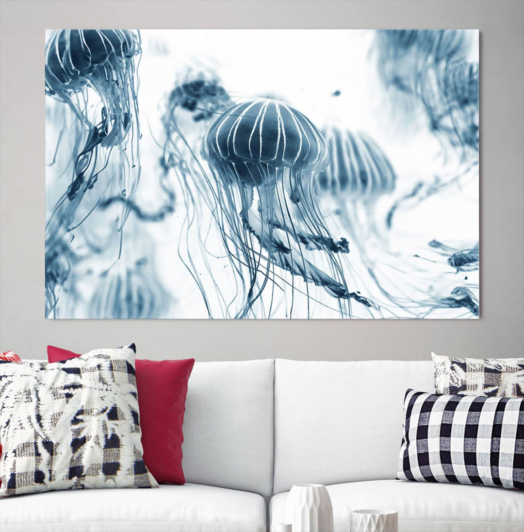 The "Abstract Jellyfish Wall Art Canvas Print" in high resolution is beautifully displayed as a triptych on a dark wall. Experience museum-quality canvas and enjoy free shipping with this stunning piece.