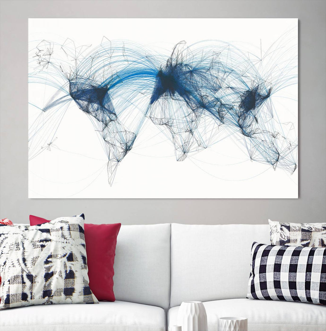 The Aviation Flight Map Wall Art is a set of three abstract panels featuring a world map with blue lines, resembling a flight map. Ideal for aviation enthusiasts, this ready-to-hang framed air traffic art print enhances the appeal of modern decor.