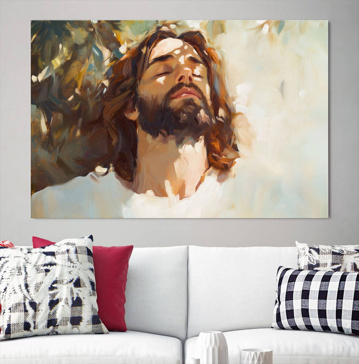 The Jesus Portrait Wall Art Canvas Print features a depiction of Jesus Christ with closed eyes, basking in sunlight. His expression exudes a peaceful, spiritual atmosphere against a blurred background.