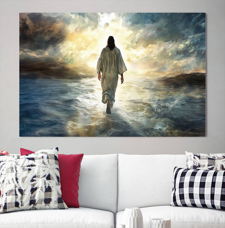 The Jesus Walking on Water Wall Art, a captivating triptych canvas print, showcases a person walking on water beneath dramatic clouds. This ready-to-hang piece seamlessly combines faith and style for your Christian home decor.