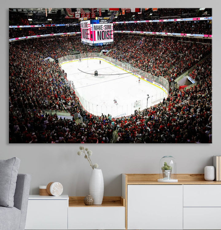 The living room features the PNC Arena Raleigh North Carolina Hurricanes Hockey Stadium Wall Art Canvas Print, which depicts a crowded ice hockey stadium with enthusiastic fans and an ongoing game, all rendered in high-resolution on museum-quality canvas.