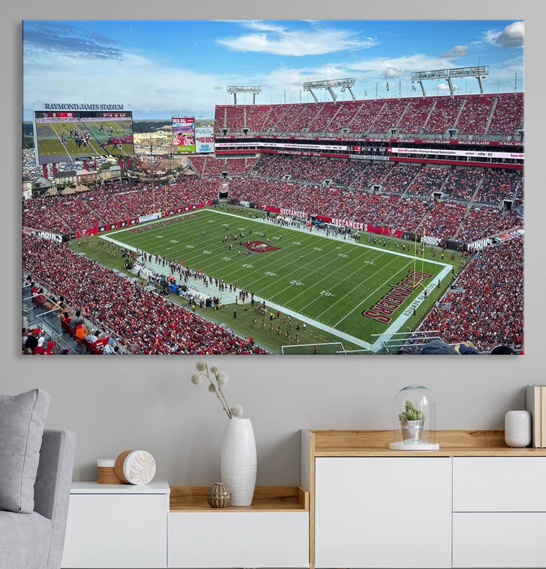 The Florida Tampa Raymond James Stadium Wall Art Canvas Print is featured above the cabinet.