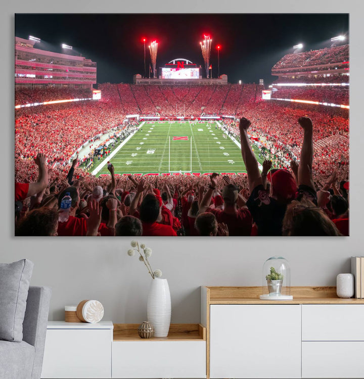 The University of Nebraska Cornhuskers Football Team Print, a vibrant three-panel canvas depicting Lincoln Memorial Stadium filled with enthusiastic fans from the end zone perspective, features a gallery-quality finish.