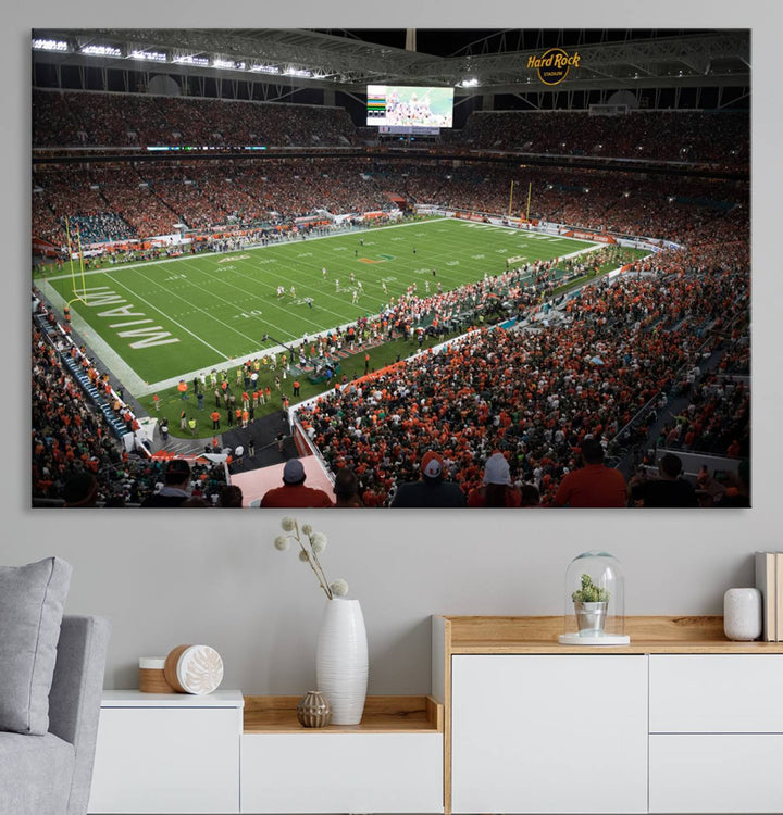 Aerial view of a Miami Hurricanes game at Hard Rock Stadium captured on canvas print, showcasing the teams on the field and fans in the stands.