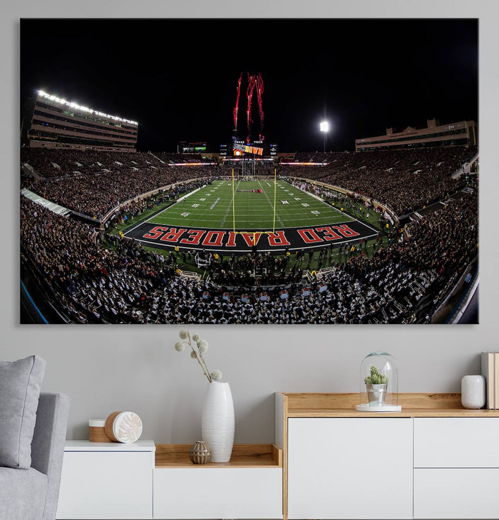 The wall features a Texas Tech Red Raiders Football Team Print on canvas, showcasing fireworks over a packed stadium at night.