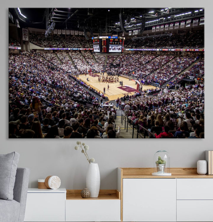 The Nebraska Basketball Arena Wall Art Canvas features an arena filled with Cornhuskers fans and players beneath a scoreboard.