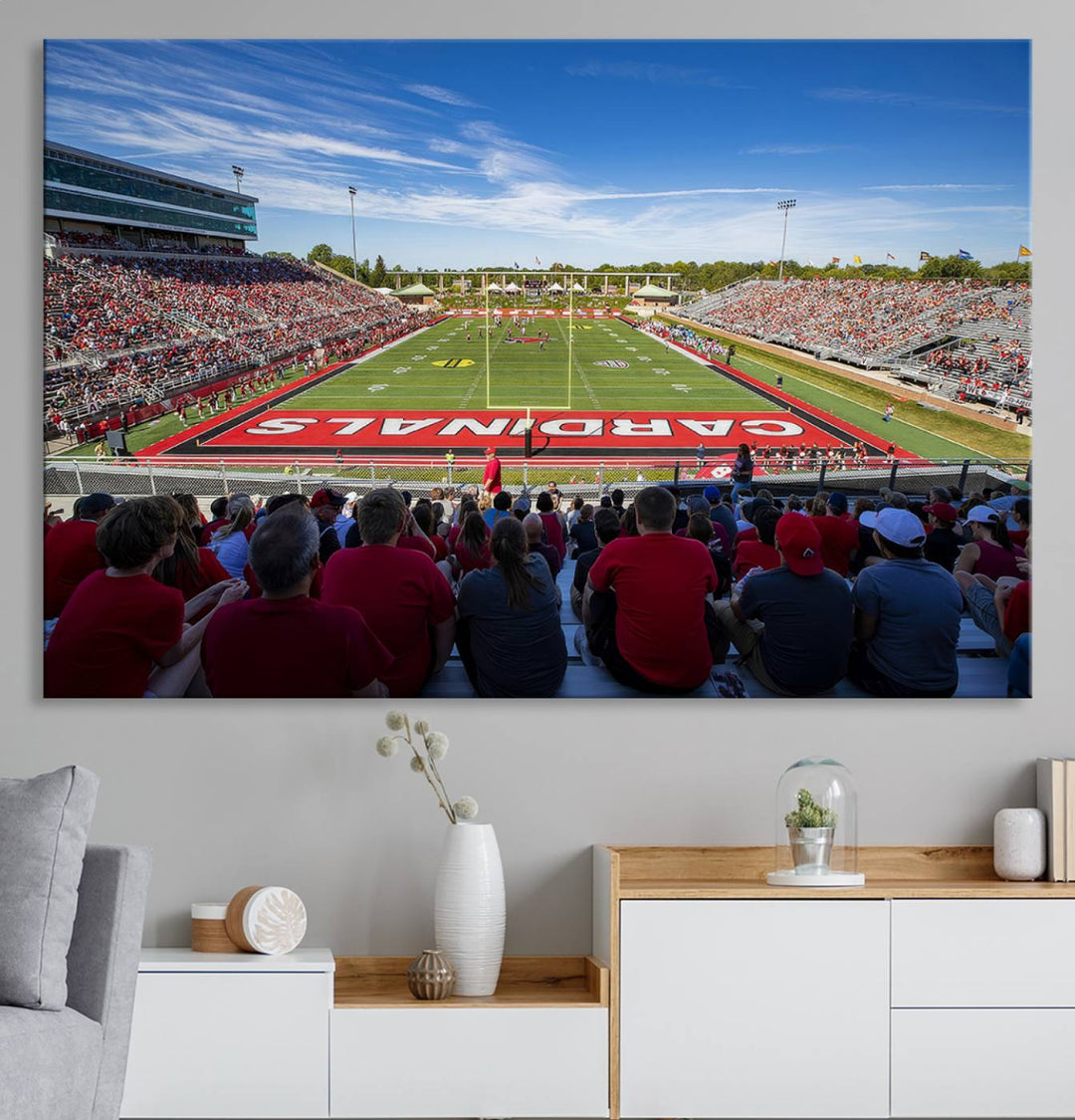 The Ball State Cardinals wall art on canvas depicts fans in red at Scheumann Stadium.