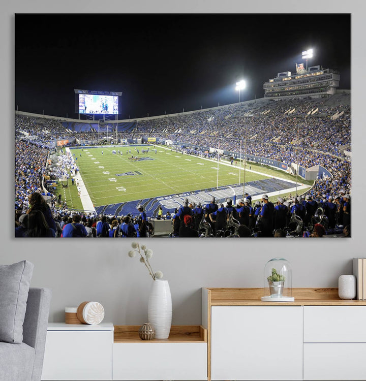 A vibrant depiction of Liberty Stadium at night, highlighting a Tigers football game on the large screen with stands filled with enthusiastic fans.