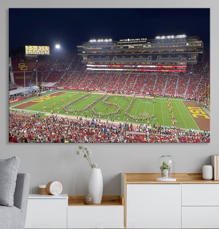 Canvas print depicting a packed stadium at night with a marching band forming USC, celebrating the Trojans at Los Angeles Memorial Coliseum.