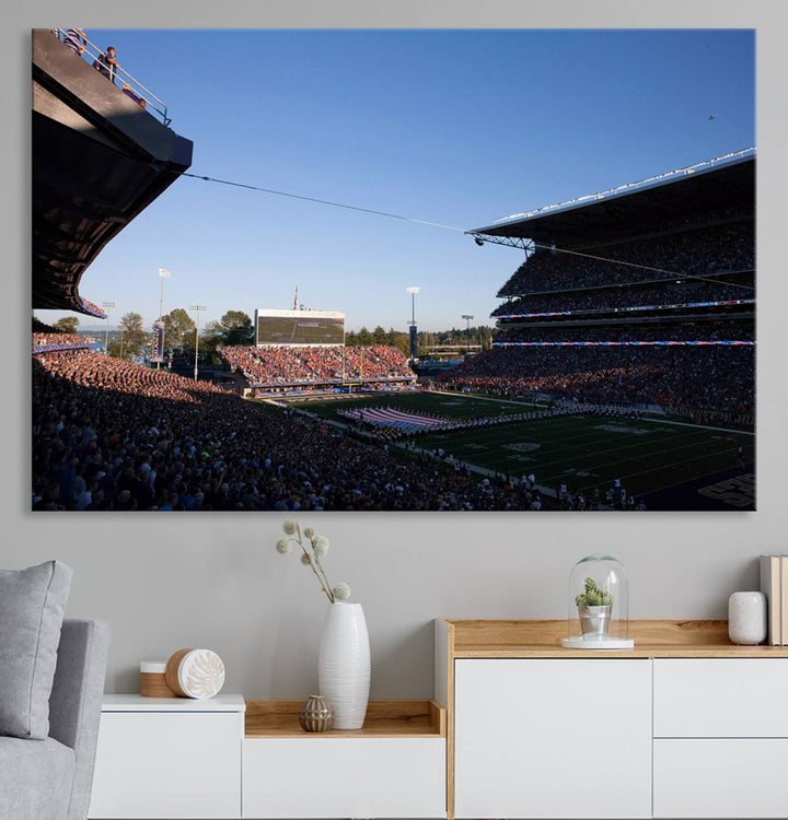 The University of Washington Huskies wall art print depicts Husky Stadium coming alive with fans as flags flutter.