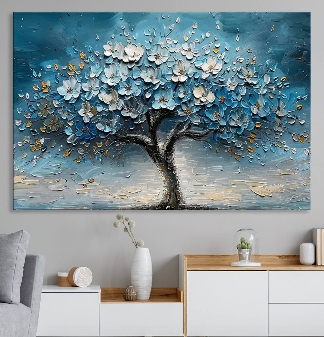 Abstract Blooming Tree Wall Art Print features blue, white, and gold textures on museum-quality canvas, perfect for modern decor.