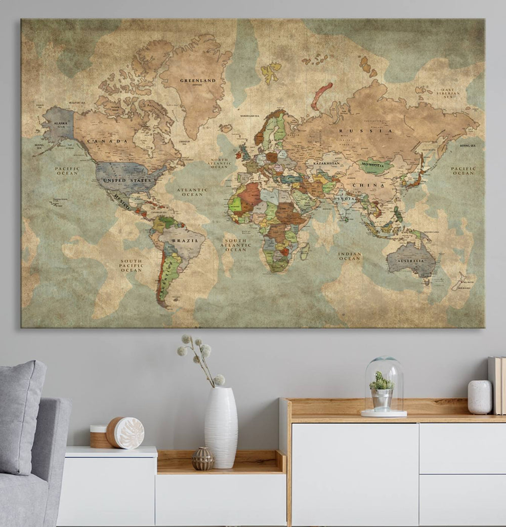 A canvas triptych featuring an antique-style world map with faded tones that highlight countries and continents.