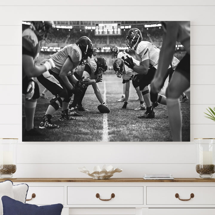 The "American Football Match Wall Art Canvas Print," featuring a black and white photo of a football game, is displayed as a triptych. This artwork is printed on museum-quality canvases and protected with a UV-coating.