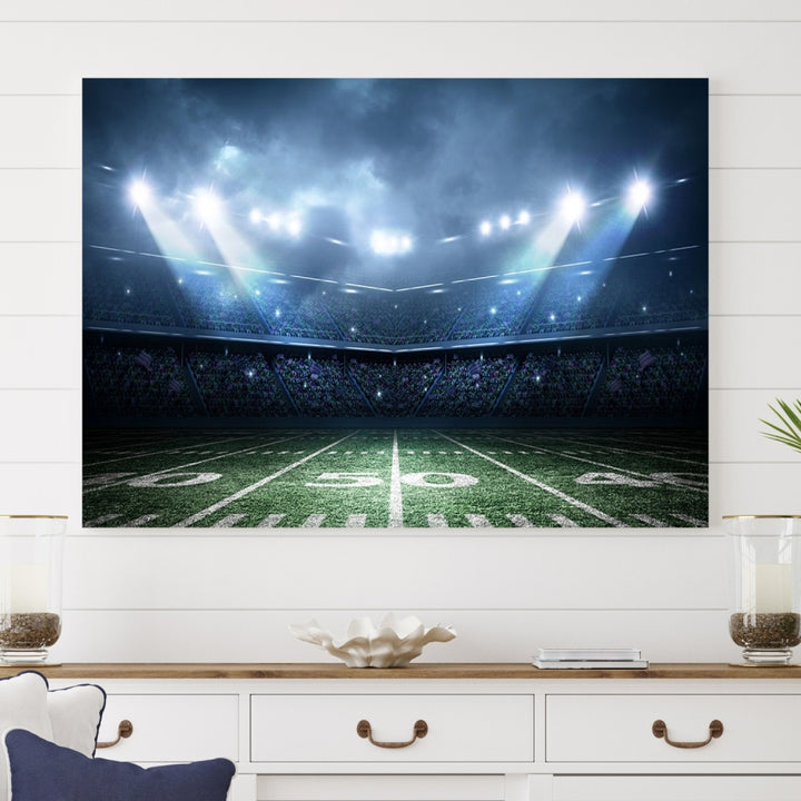 The *American Football Stadium Wall Art Canvas Print*, showcasing a lit football stadium, hangs prominently.