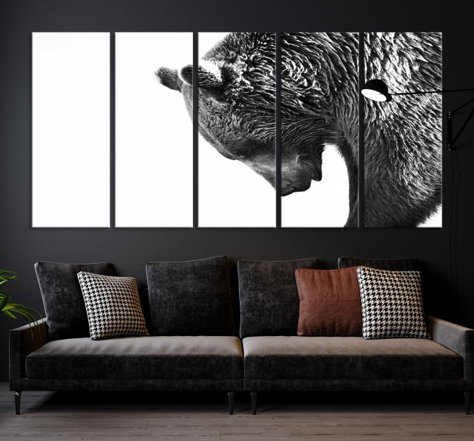 A black and white triptych from the "Black and White Grizzly 399 Bear Canvas Print Wall Art" collection decorates the dark wall.