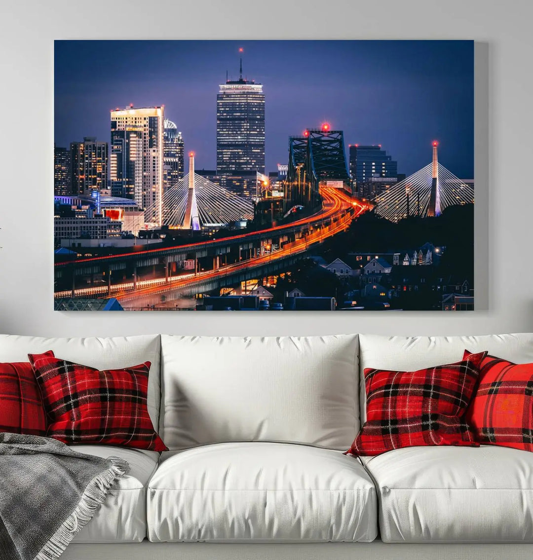 The "Boston City Lights Night Skyline Cityscape View" artwork on the wall showcases a brightly lit bridge at night. It is displayed on museum-quality canvas with a UV-protective coating.