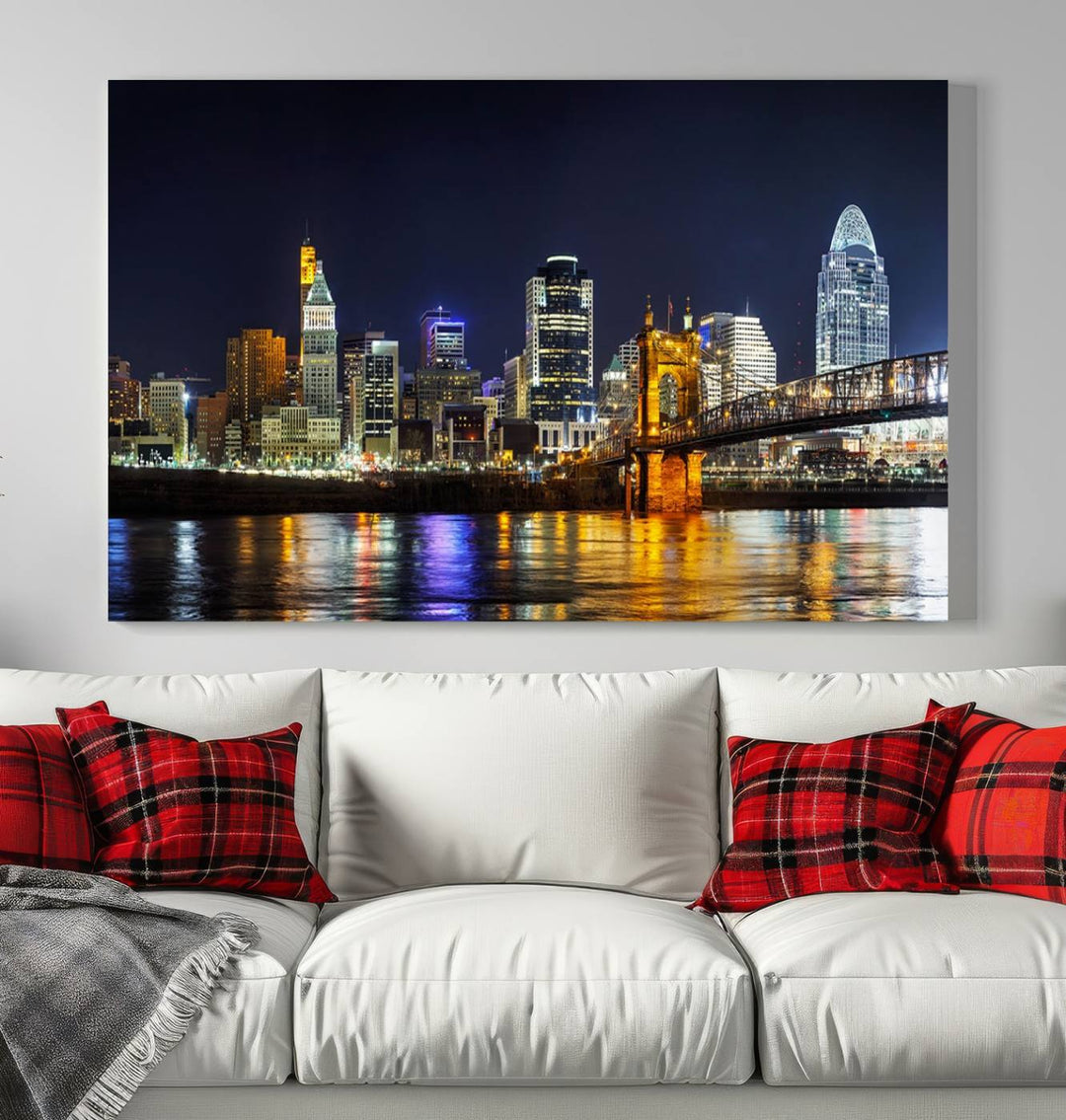 The Cincinnati City Lights Night Skyline Cityscape View Wall Art Canvas Print, crafted on museum-quality canvas with UV-protective coating and ready to hang, adds a touch of sophistication to the wall.