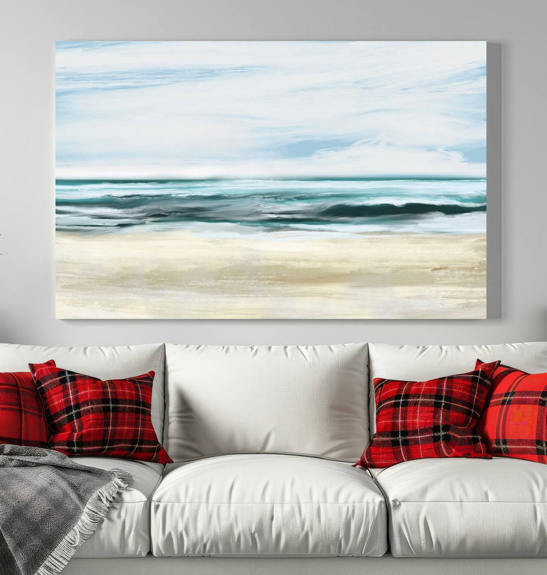 The room features the Ocean Abstract Wall Art Canvas Print, a triptych beach painting on museum-quality canvas with a gallery-wrapped finish and UV-protective coating.