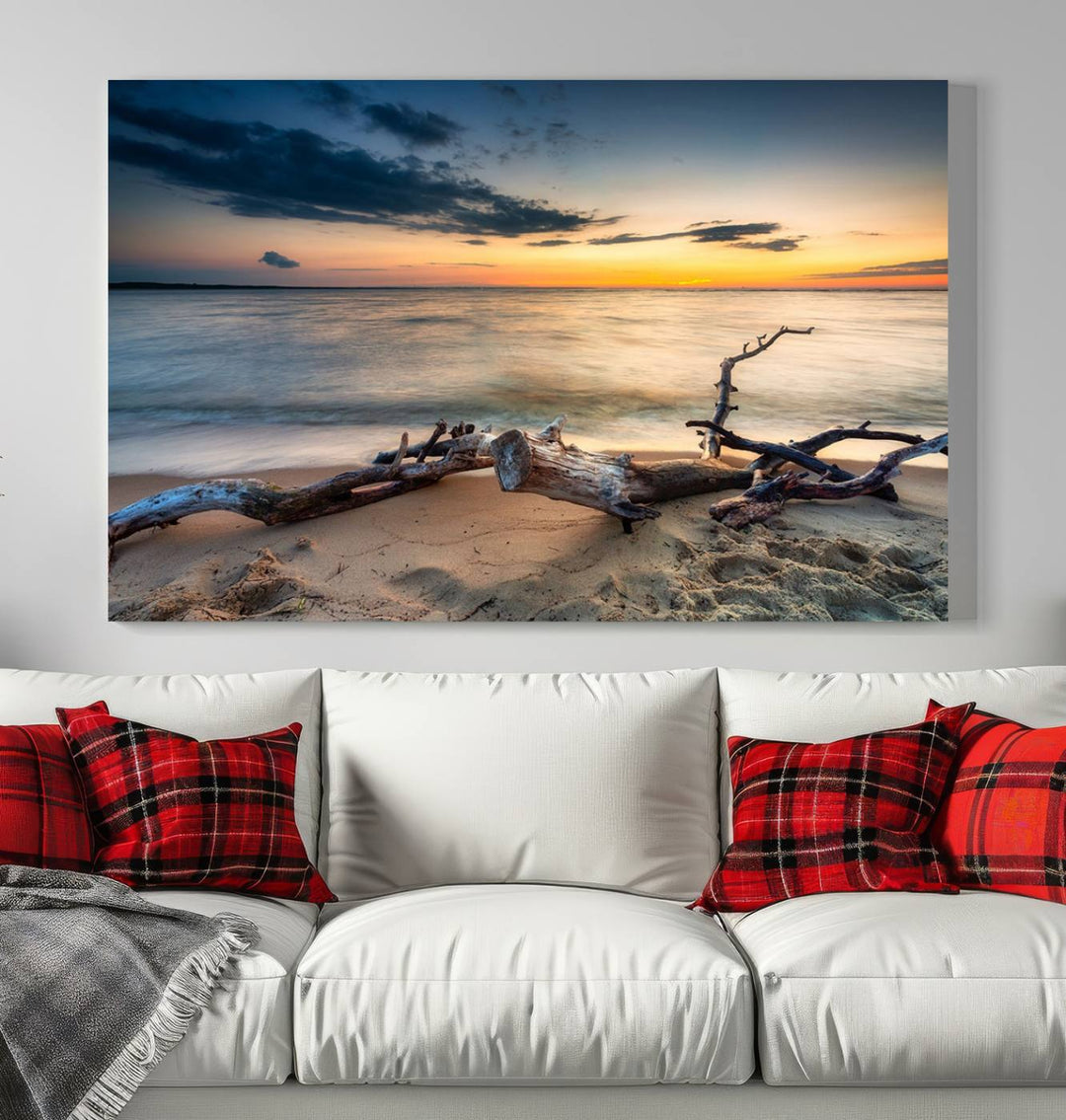 A captivating piece of Ocean Sunset Beach Wall Art Canvas Print, gallery wrapped, graces the gray wall.