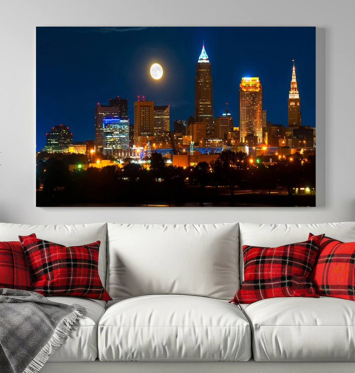 The "Cleveland Night Skyline Wall Art City Cityscape Canvas Print" adds elegance to the room with its depiction of a city skyline and full moon on museum-quality canvas. The artwork is enhanced by a UV-protective coating to ensure lasting brilliance.