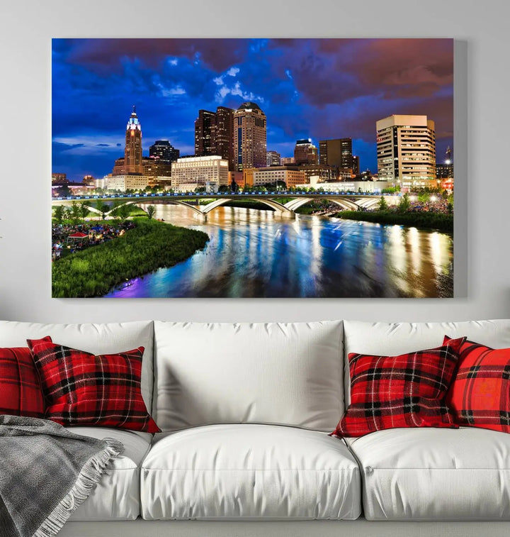 Columbus City Lights Night Bright Blue Cloudy Skyline Cityscape View Wall Art Canvas Print, gallery wrapped on museum-quality canvas, reflecting on a river.