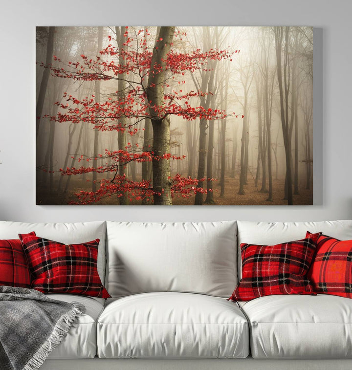 The living room features the Foggy Forest Wall Art, an Autumn Trees Canvas Print that showcases a serene nature scene with foggy woodland decor and a tree adorned in vibrant red leaves.