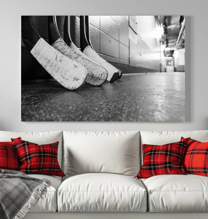 A living room featuring a large Ice Hockey Wall Art Canvas Print on gallery-wrapped canvas.