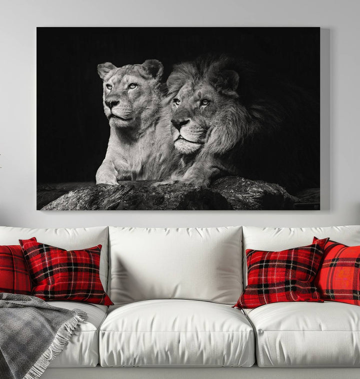 The elegant wildlife portrait, "Lion Couple Canvas Wall Art Print," featuring a black and white depiction of a lion family, majestically decorates the living room wall.