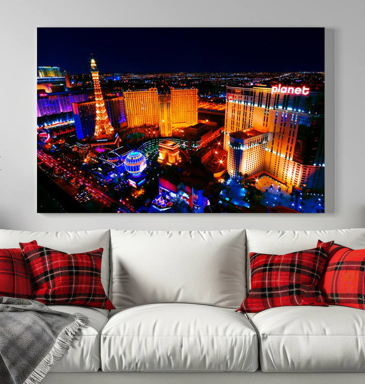 Las Vegas Wall Art Canvas Print showcases a dynamic and luminous cityscape at night with tall buildings and bustling streets. Expertly printed on museum-quality canvas, this gallery-wrapped artwork is enhanced with a UV-protective coating to ensure lasting brilliance.