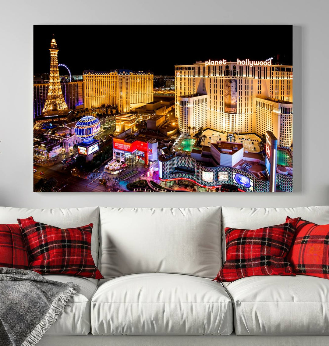 The Las Vegas Wall Art Canvas Print is a triptych set that showcases a stunning night view of Las Vegas. The illuminated buildings and the iconic faux Eiffel Tower add elegance to any space. Each piece comes with a UV-protective coating and is ready to hang, ensuring both style and durability.