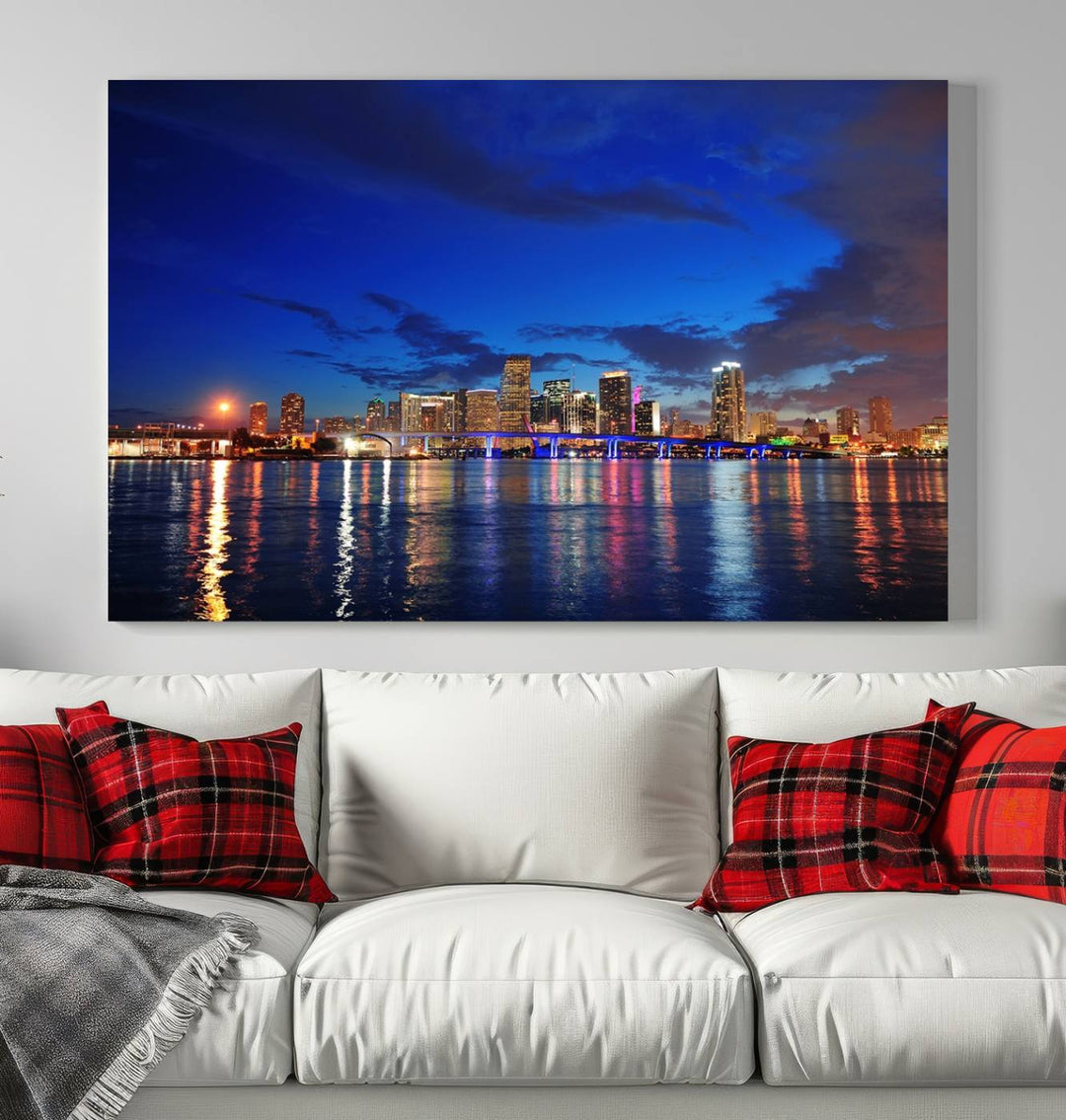 A large Miami City View Wall Art Canvas Print featuring the Miami City Skyline Panorama at night is displayed above the dresser.