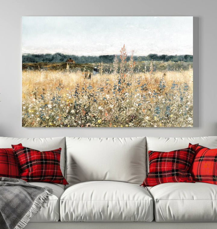 The "Wildflower Field Wall Art Canvas" brings rustic charm to the room with its nature-inspired landscape print, making it a perfect addition to the living room or office.